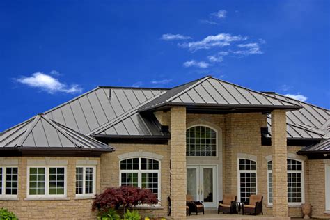 beige house with cocoa brown metal roof|beige metal roof exterior ideas.